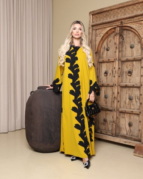 Zaafaran – mustard abaya with black leaf appliqué, Balqees Maison Arabia